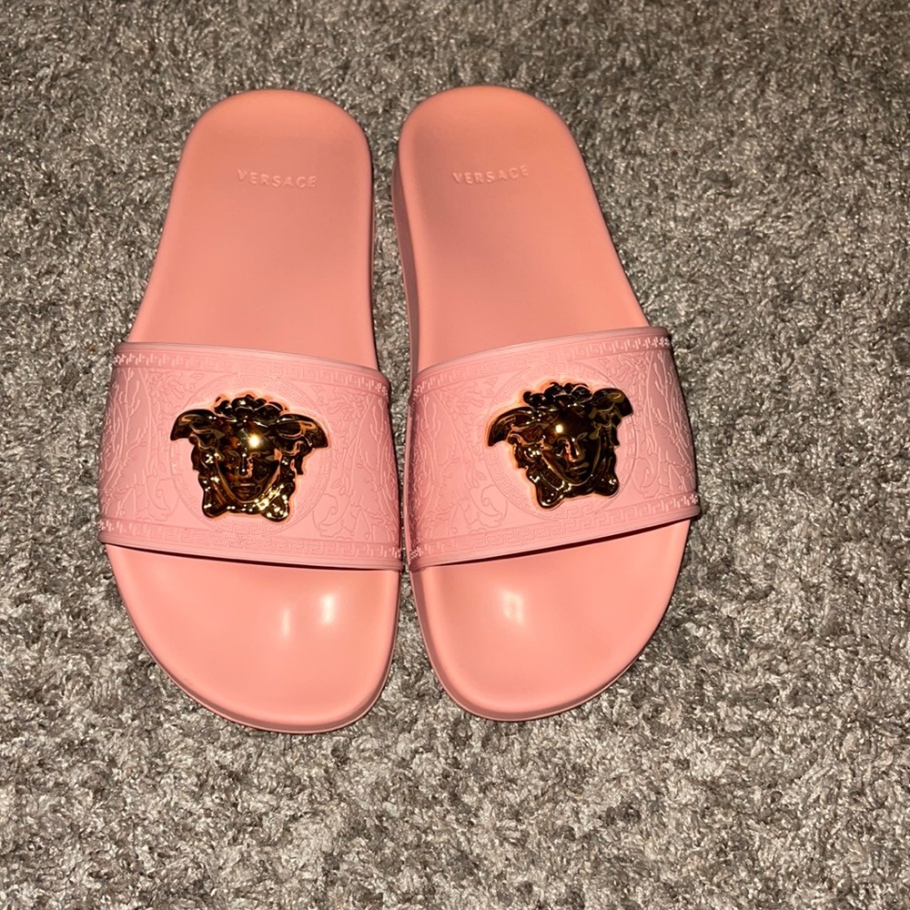 Versace pool slides … fits small size 37.5 wore 4x